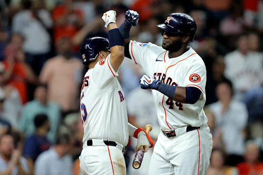 Houston Astros players celebrating with a fist bump