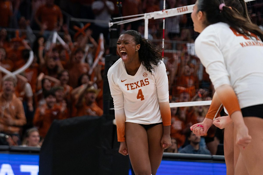 Texas Volleyball player celebrating during a match